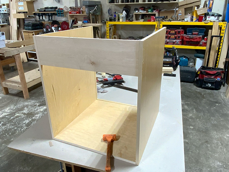 Cabinet box construction resisting racking and torsion